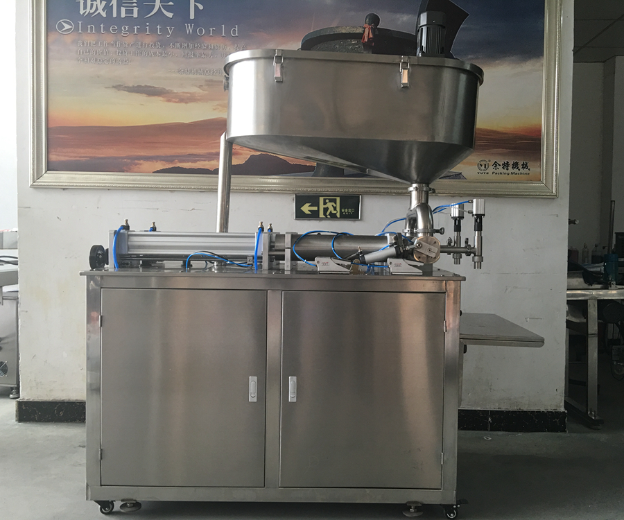 半自動(dòng)雙頭辣椒醬灌裝機(jī) 半自動(dòng)雙頭辣椒醬灌裝機(jī)